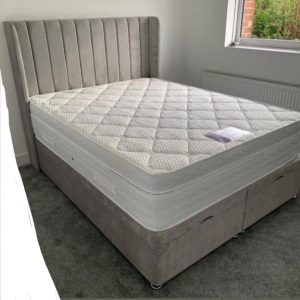 Winchester winged end-opening ottoman bed, combining storage and classic style with a functional design.