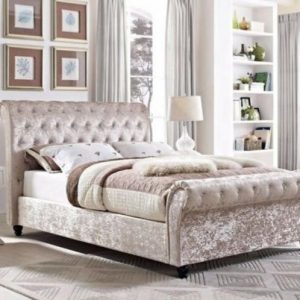 Bordeaux Chesterfield sleigh bed, combining classic sleigh design with Chesterfield detailing for a luxurious touch.