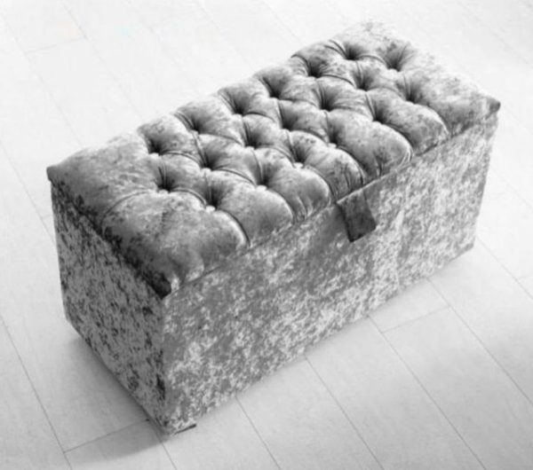 Bobby blanket ottoman storage box with fabric upholstery in a compact design.