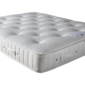 Traditional orthopaedic mattress providing firm support and comfort for restful sleep.
