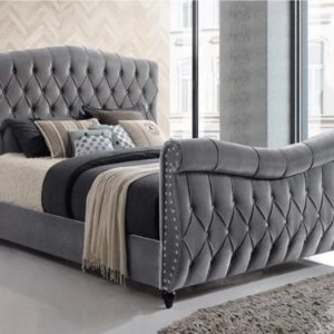 Sleigh bed collection featuring various luxurious designs with elegant curves and comfortable frames.