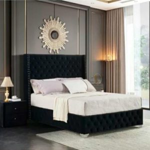 Emperor winged Chesterfield bed frame featuring elegant upholstery and a classic design.