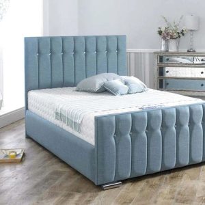 Isobelle upholstered panel bed in marine, featuring a chic design and plush fabric for added luxury.